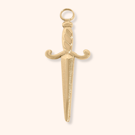 Gold sword-shaped pendant on a white background