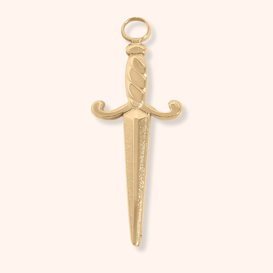 Gold sword-shaped pendant on a white background